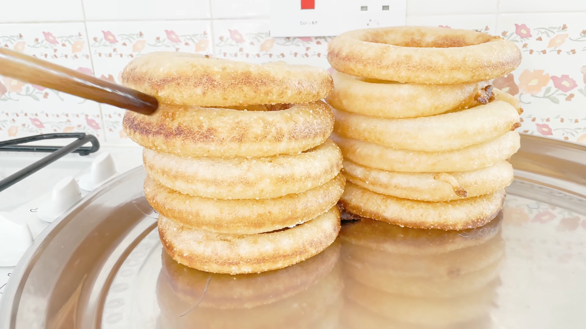 Sel Roti is a traditional Nepali sweet, ring-shaped rice bread that is deep-fried to golden perfection. Made from rice flour, sugar, milk, and a hint of cardamom, it has a crispy exterior and soft, slightly chewy inside. Sel Roti is especially popular during festivals like Dashain and Tihar, when families make it at home and share it with relatives and friends.This delicious treat is often paired with yogurt, milk, or tea, making it a favorite breakfast or snack across Nepal. Its aroma, taste, and cultural significance make Sel Roti a must-try for anyone visiting Nepal, offering a true flavor of Nepali tradition.