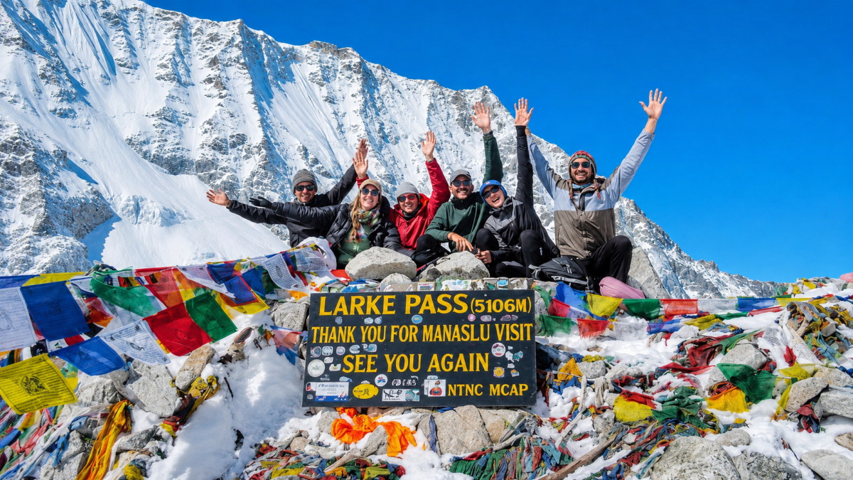 Manaslu Trek- 10 days team at Larke Pass 5106m with snow-covered Himalayas