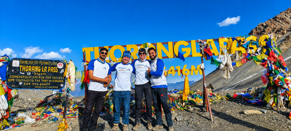 Annapurna Circuit Trek trekkers at Thorong La Pass, 5,416 meters, Nepal